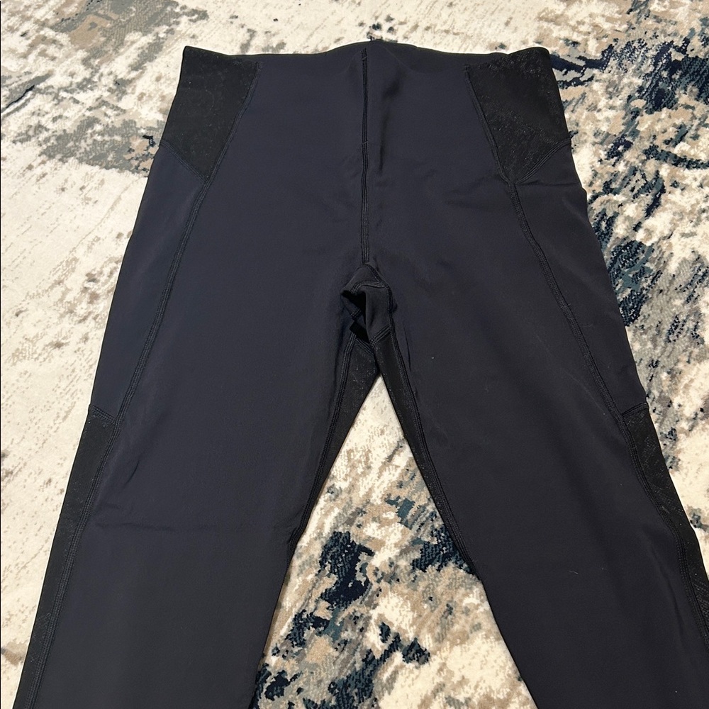 Athleta stay fly reflective 7/8 tight. Never worn.